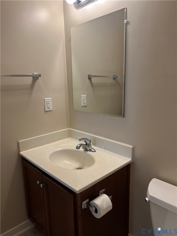 9055 Castle Point Road Glen Allen, VA 23060 - Photo 14 of 19 a bathroom with a sink and a toilet
