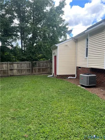 a backyard of a house with lots of green space
