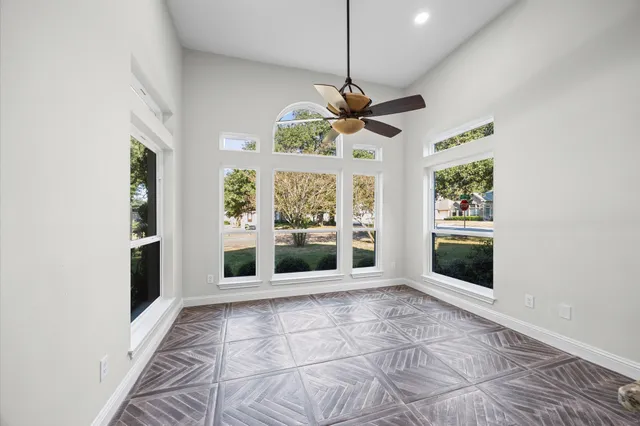 a view of an entryway with a chandelier