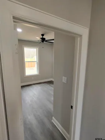 an empty room with windows
