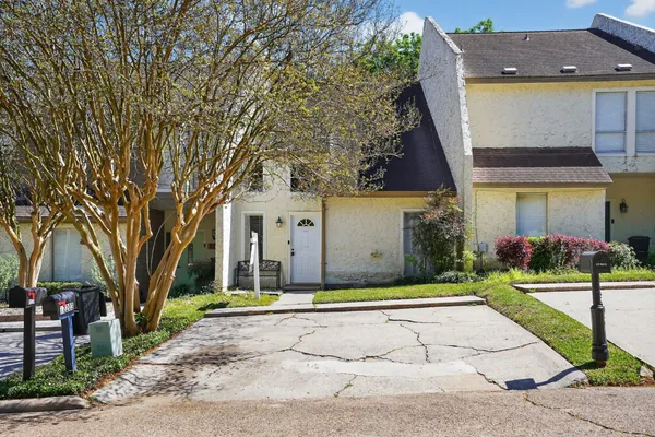 front view of house with a yard
