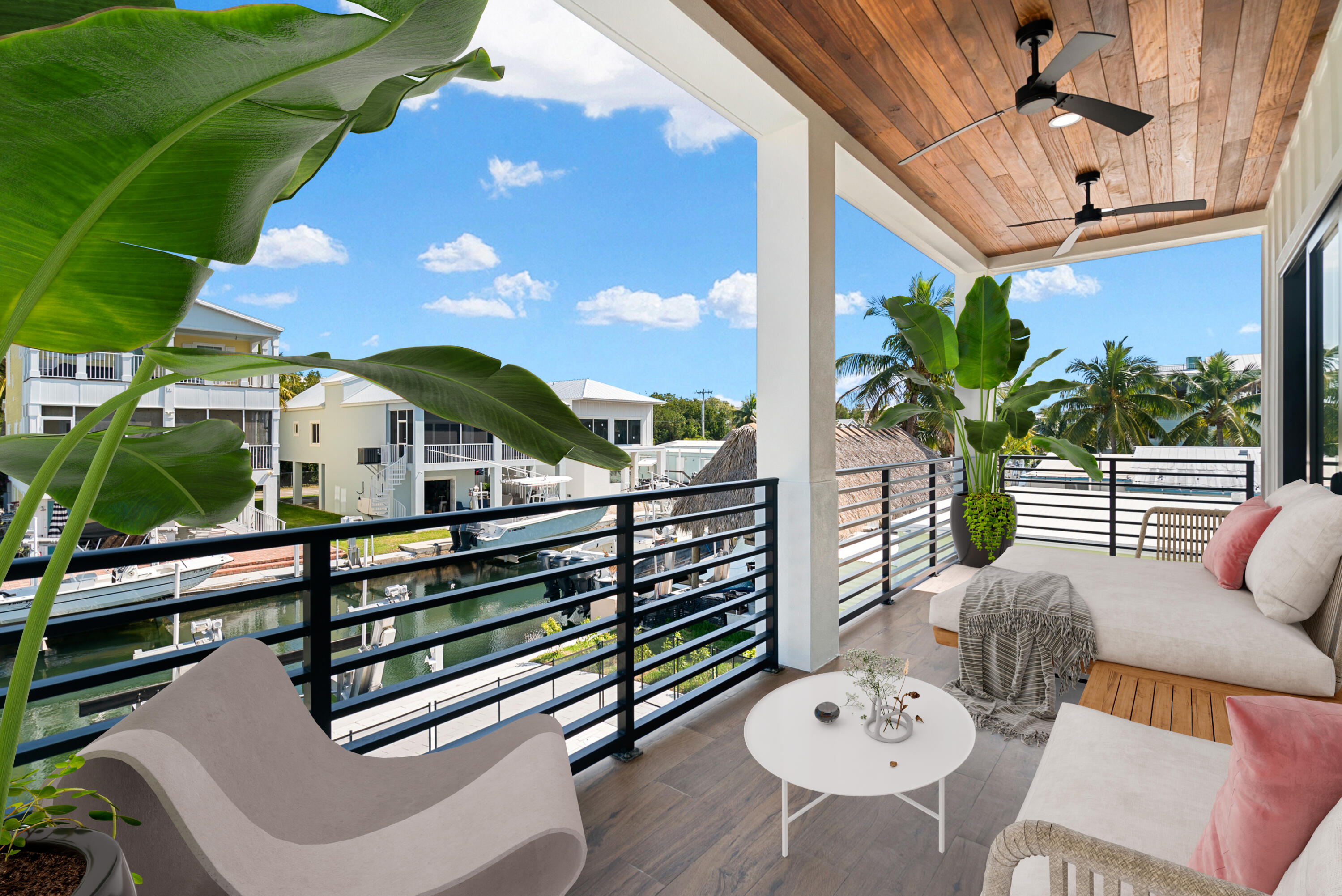 27 Ocean Drive Key Largo, FL 33037 - Photo 16 of 61 a view of a chairs and table in the balcony