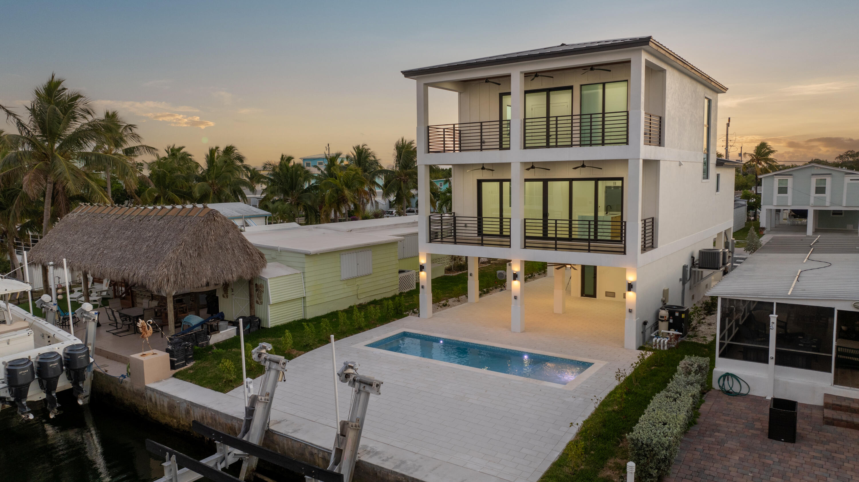 27 Ocean Drive Key Largo, FL 33037 - Photo 2 of 61 an aerial view of a house with swimming pool