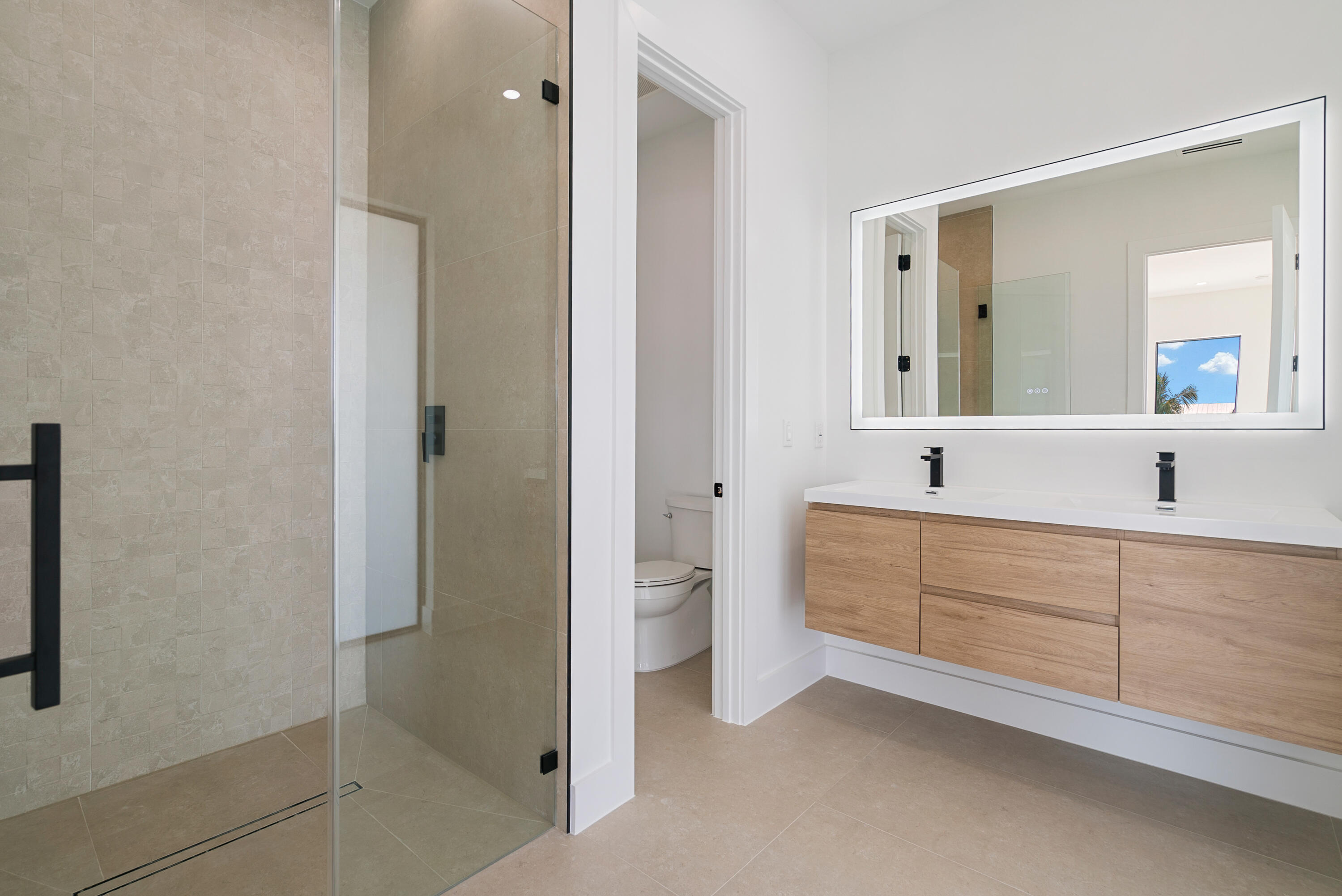 27 Ocean Drive Key Largo, FL 33037 - Photo 34 of 61 a spacious bathroom with a double vanity sink and a mirror