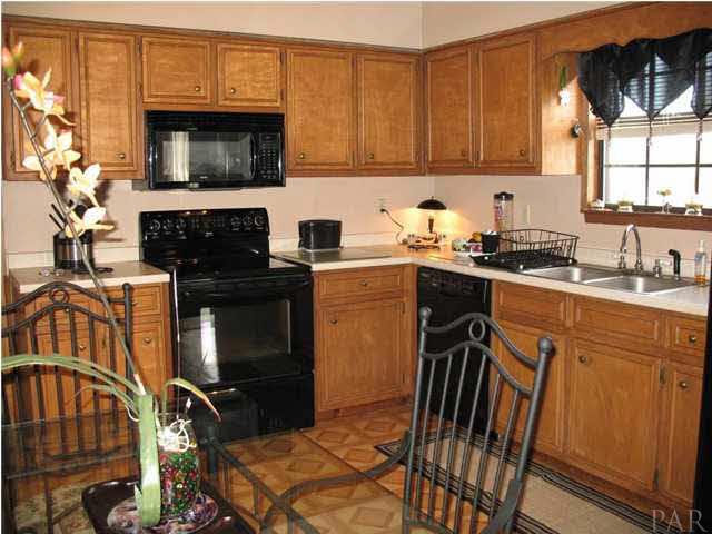 3043 Ranchette Square Gulf Breeze, FL 32563 - Photo 6 of 15 KITCHEN WINDOW OVERLOOKS HUGE BACKYARD