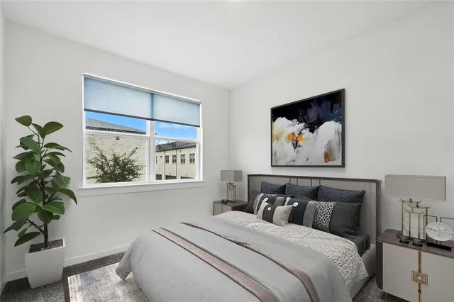 a living room with furniture and window