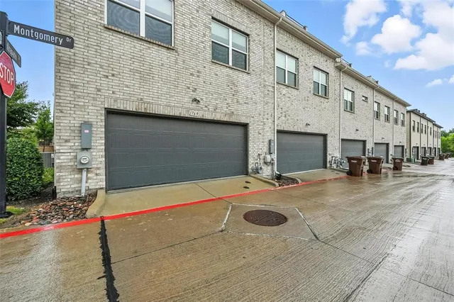 a bathroom with a double vanity sink mirror and shower