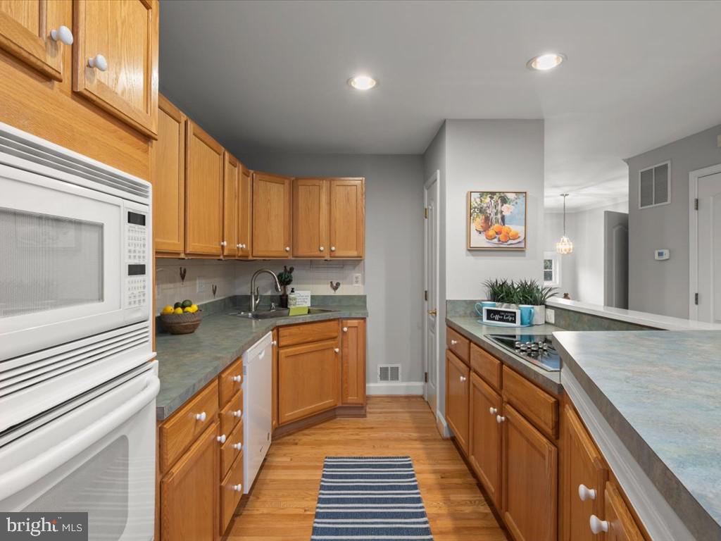 123 Rivanna Terrace Southwest Leesburg, VA 20175 - Photo 14 of 53 Kitchen w/ Wall Oven, Microwave, and Cooktop