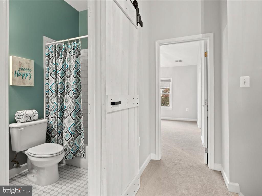 123 Rivanna Terrace Southwest Leesburg, VA 20175 - Photo 25 of 53 Sliding Barn Door opens to Renovated 2nd Full Bath
