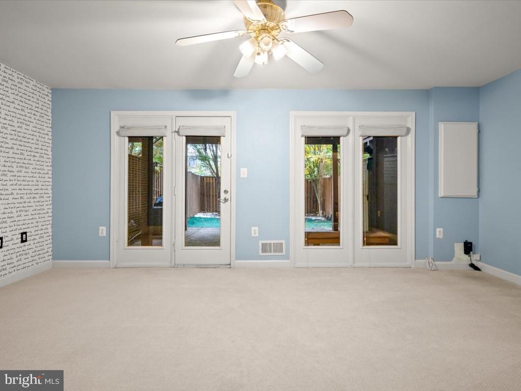 123 Rivanna Terrace Southwest Leesburg, VA 20175 - Photo 31 of 53 Recreation rm in lower lvl w/ French Door to Patio