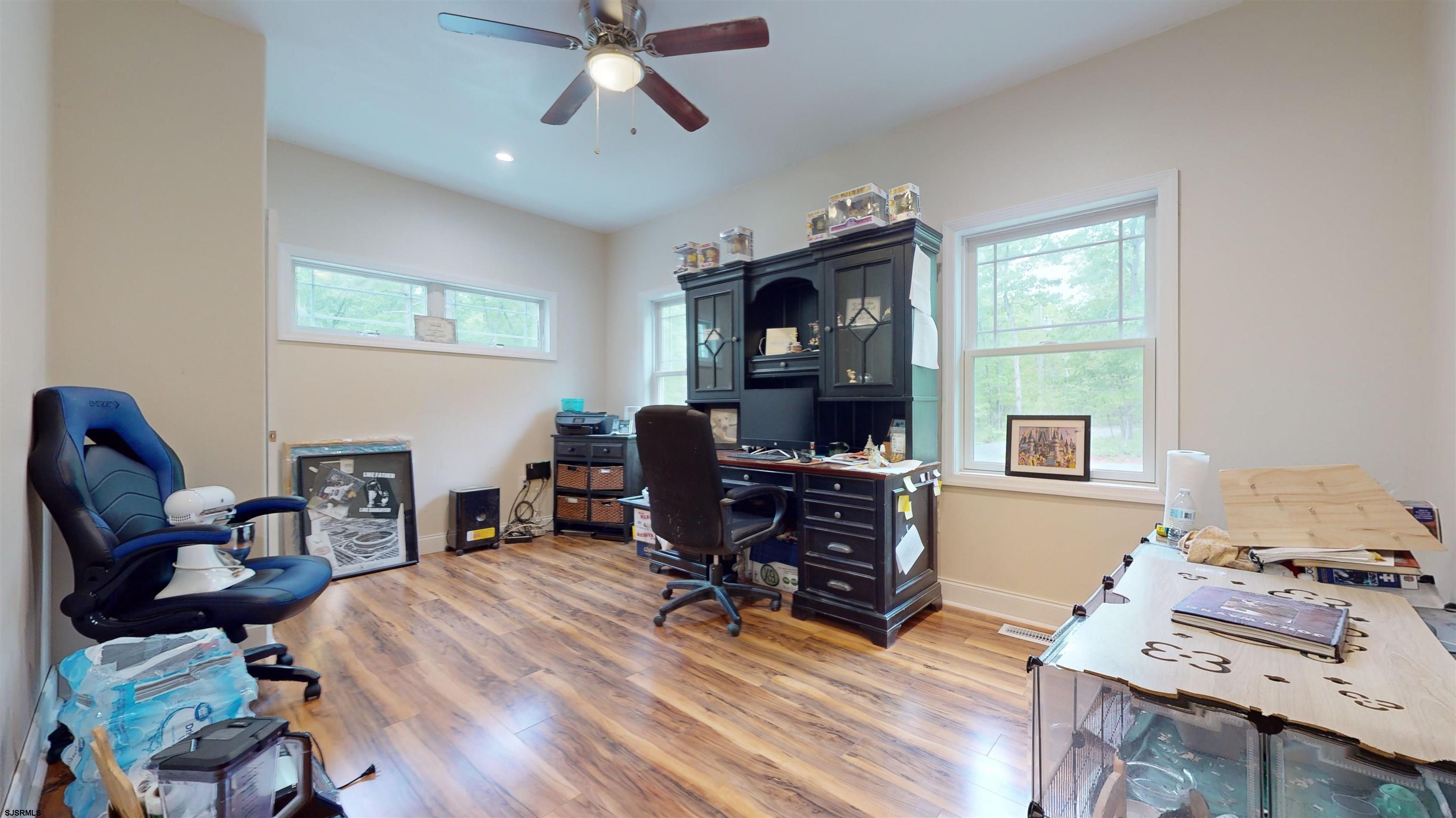 181 3rd Estell Manor, NJ 08319 - Photo 11 of 34 a view of a workspace with furniture and a window