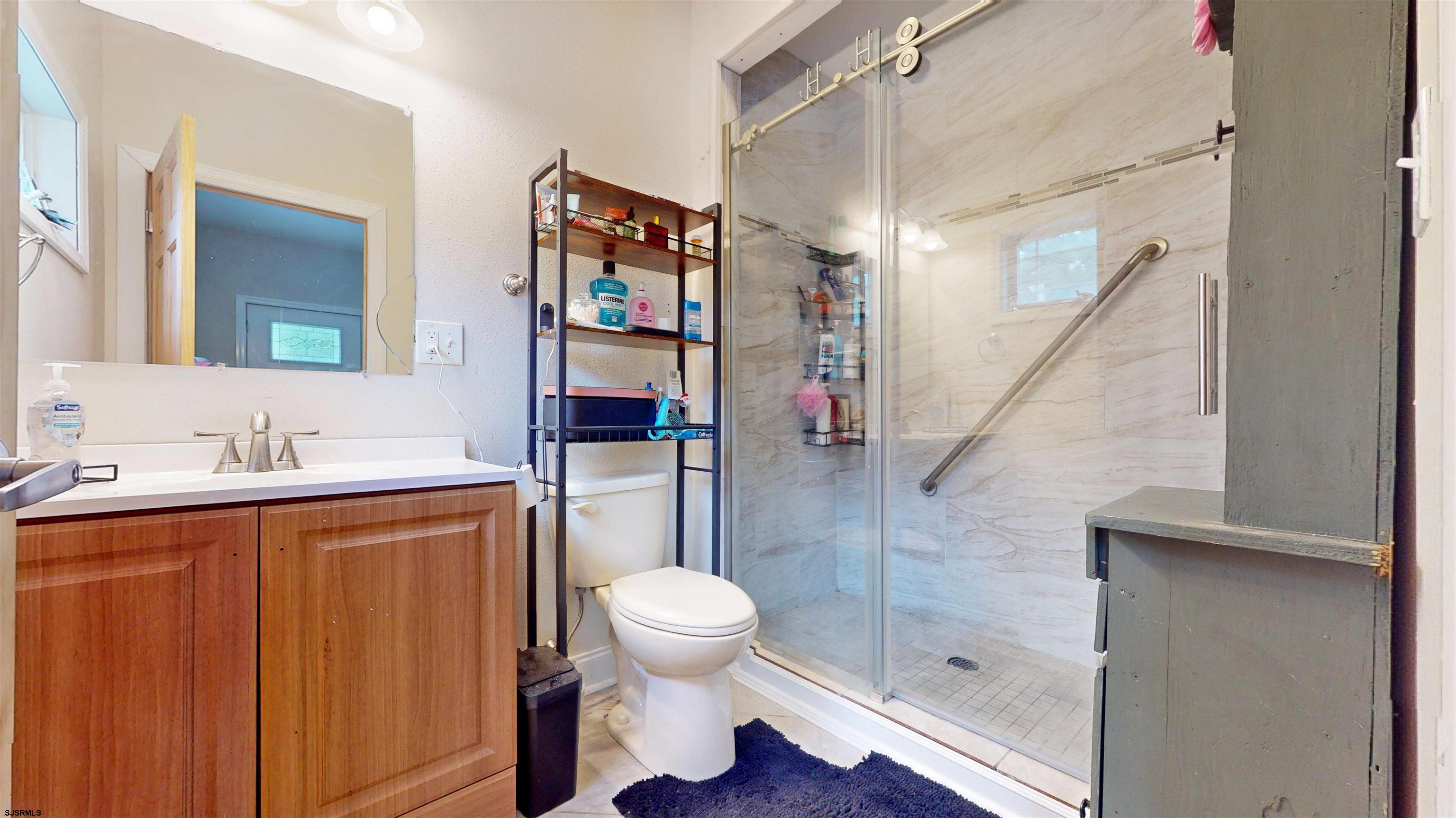 181 3rd Estell Manor, NJ 08319 - Photo 14 of 34 a bathroom with a sink toilet and shower