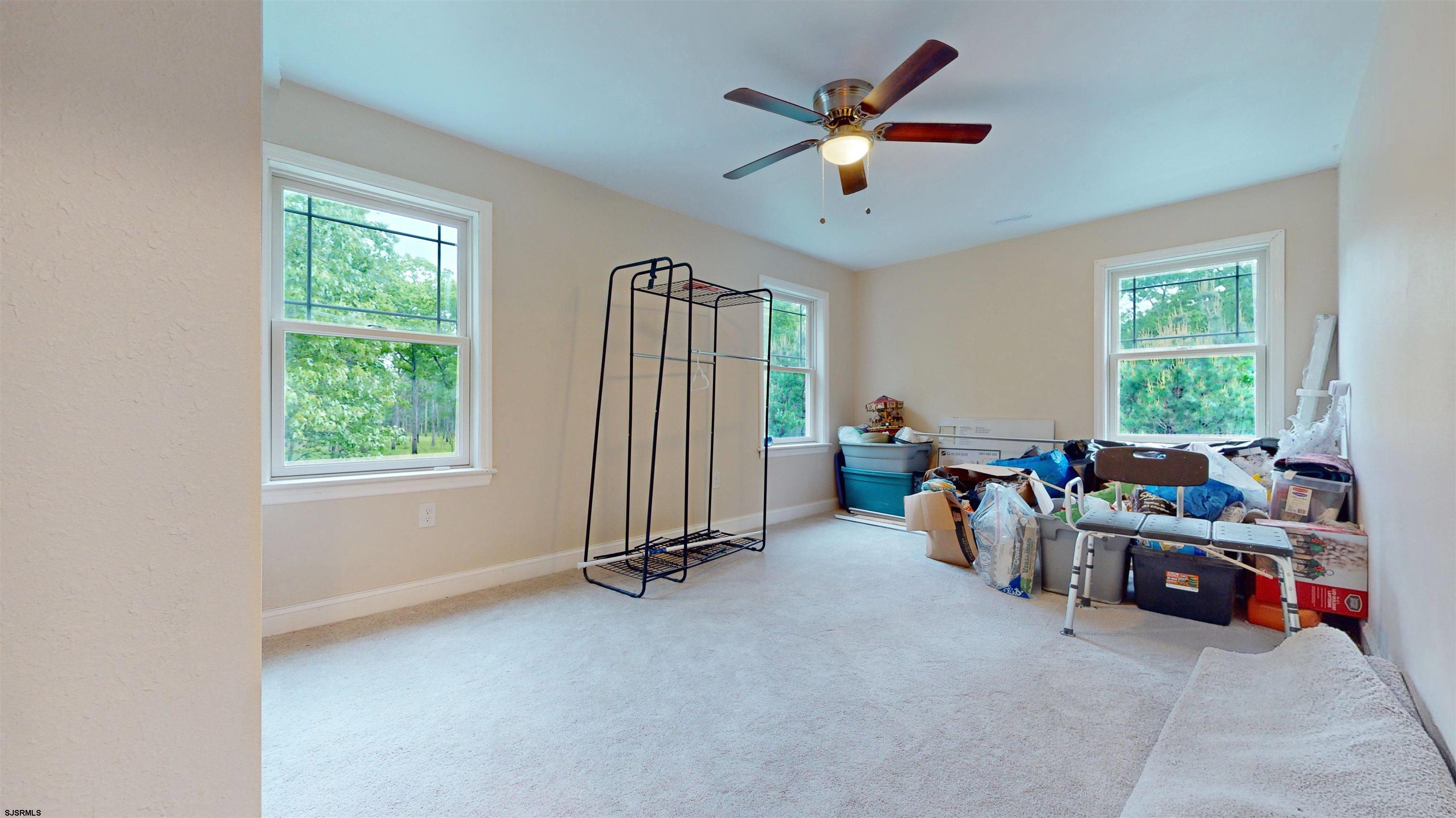 181 3rd Estell Manor, NJ 08319 - Photo 15 of 34 a view of a workspace with furniture and a window
