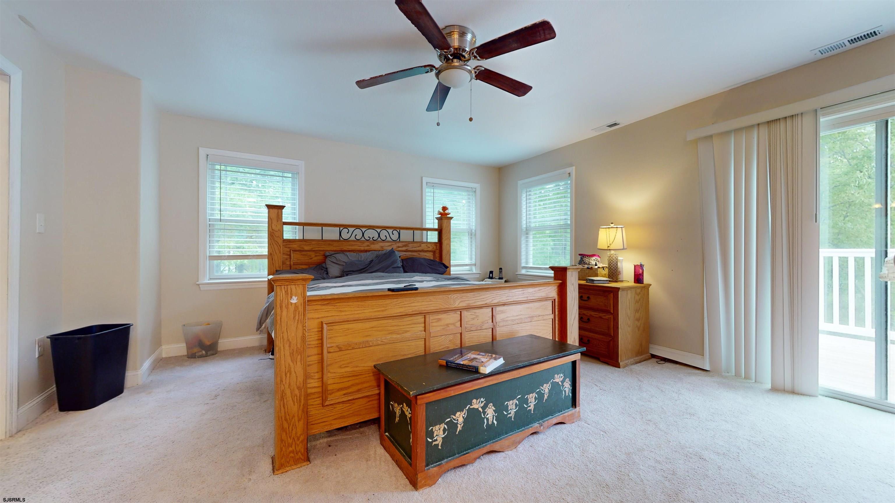 181 3rd Estell Manor, NJ 08319 - Photo 20 of 34 a bed room with a bed and a window