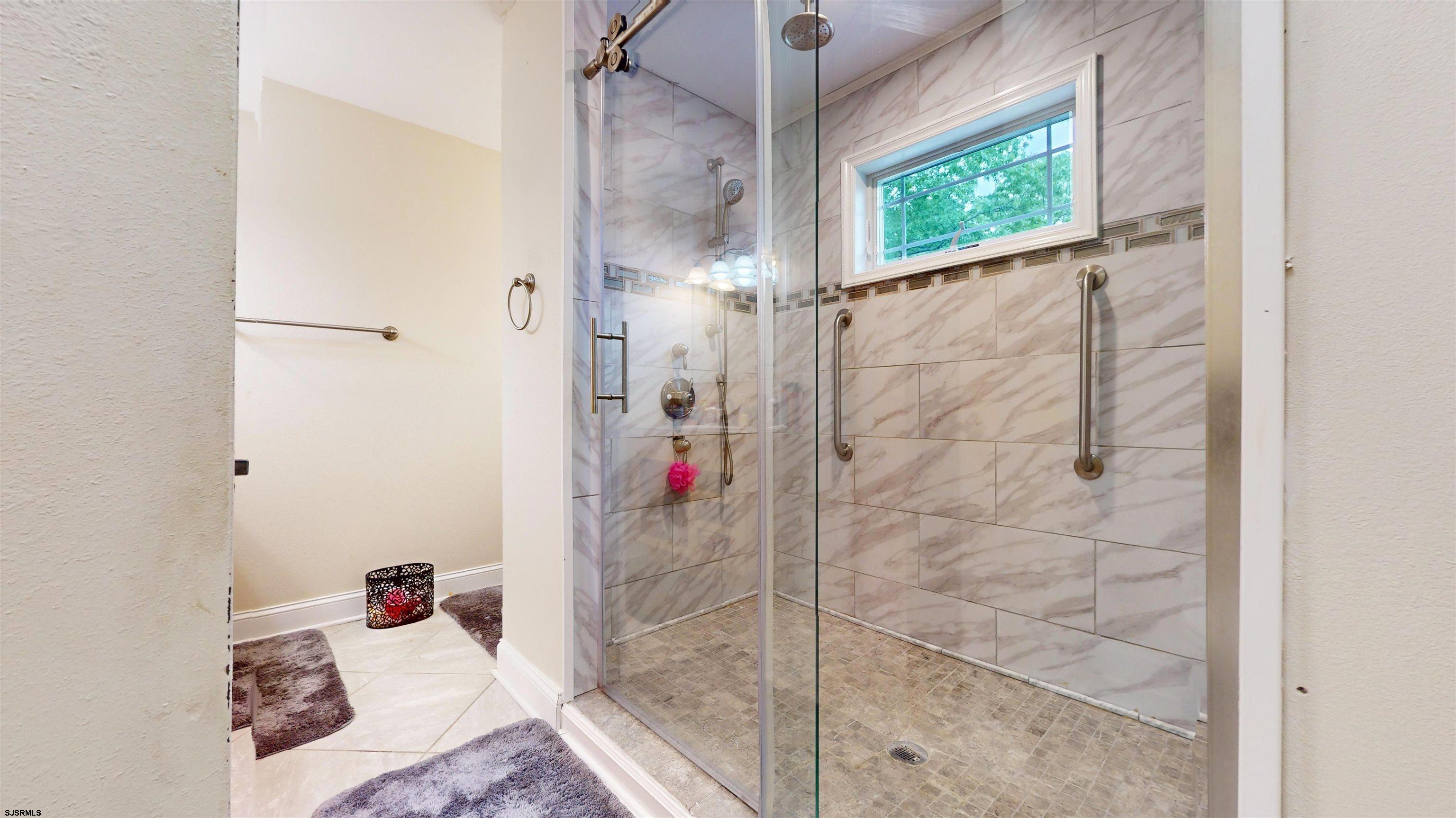 181 3rd Estell Manor, NJ 08319 - Photo 24 of 34 a bathroom with a shower