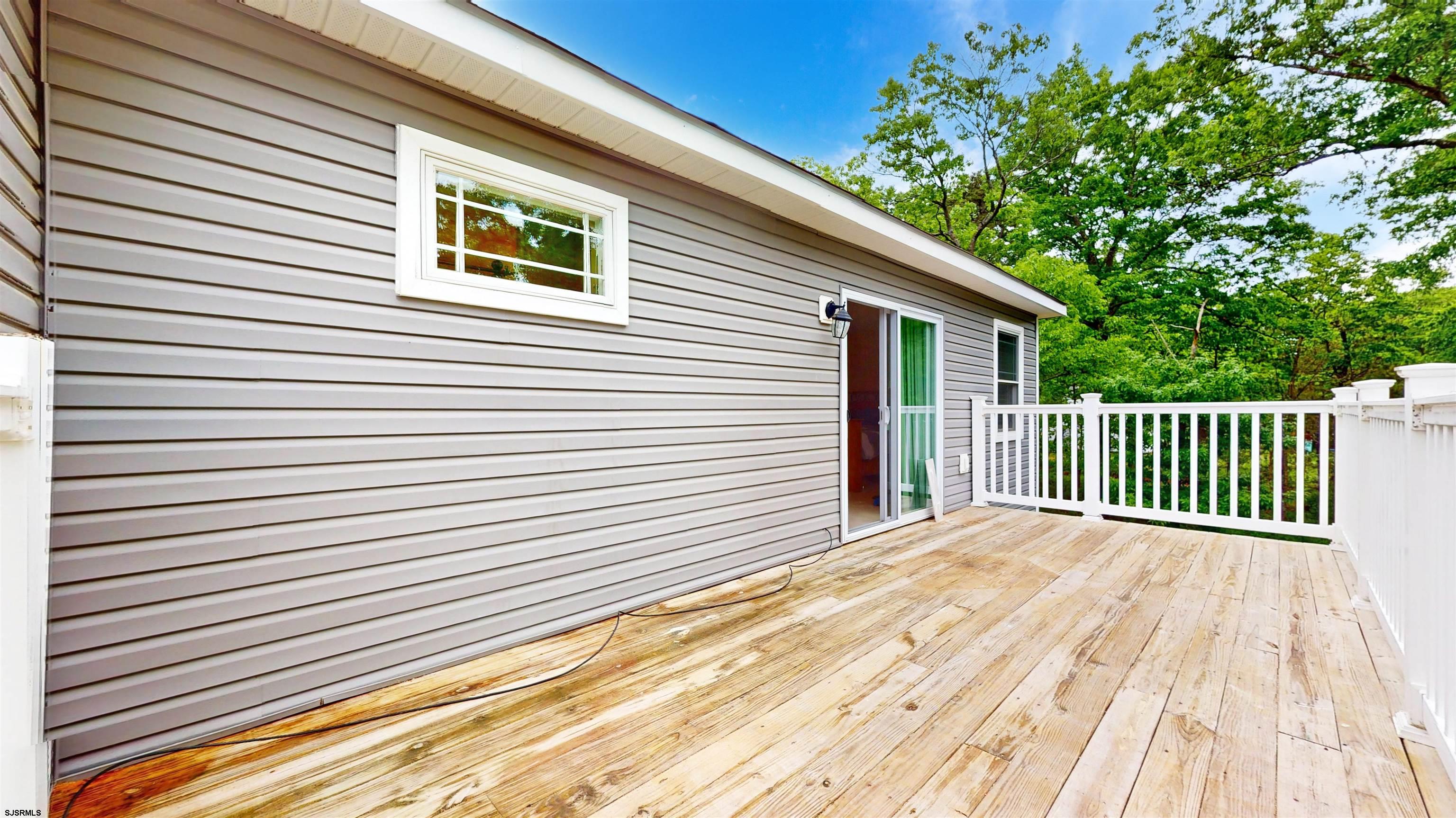 181 3rd Estell Manor, NJ 08319 - Photo 26 of 34 a view of a wooden deck