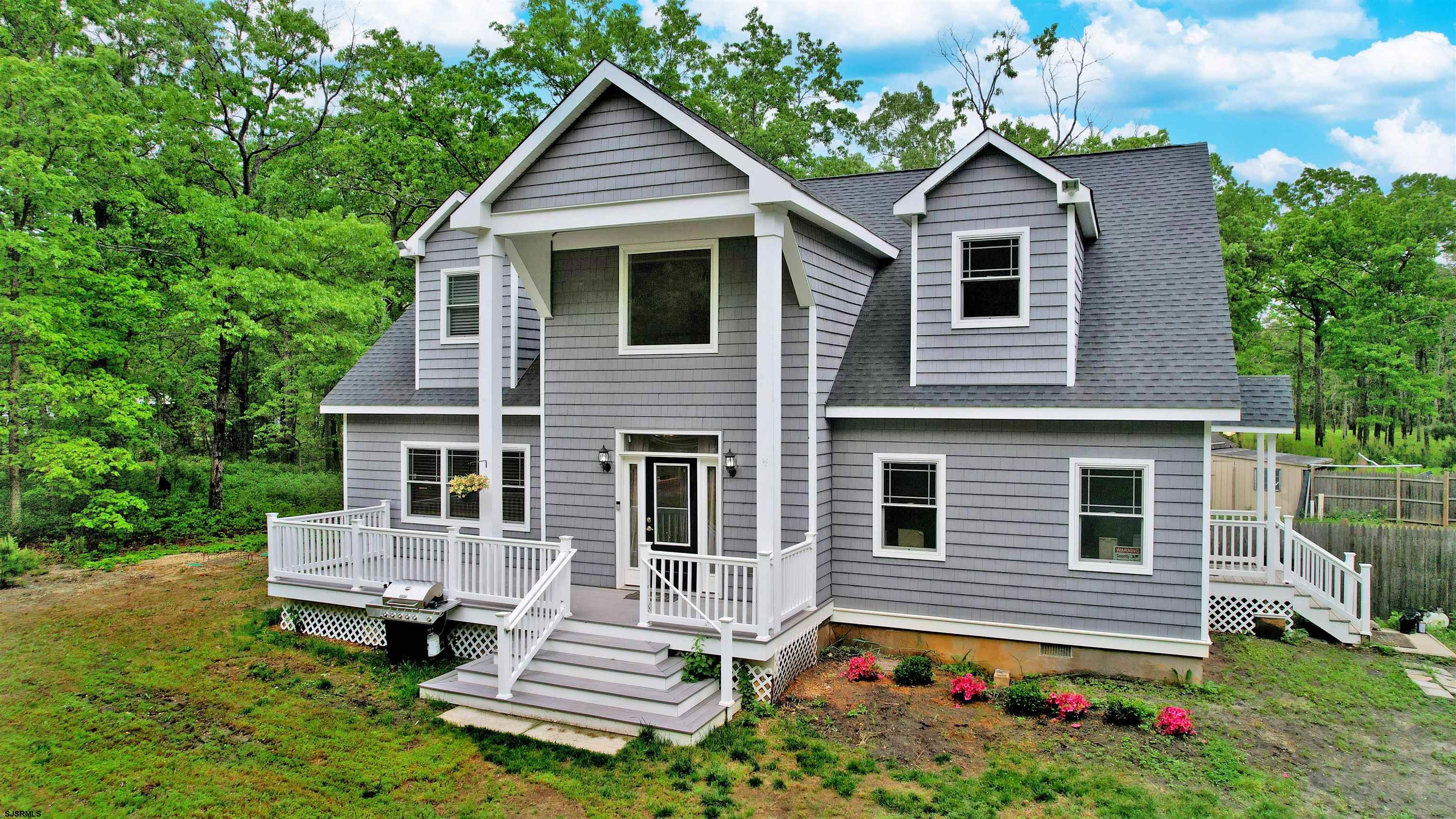 181 3rd Estell Manor, NJ 08319 - Photo 30 of 34 a front view of a house with a garden