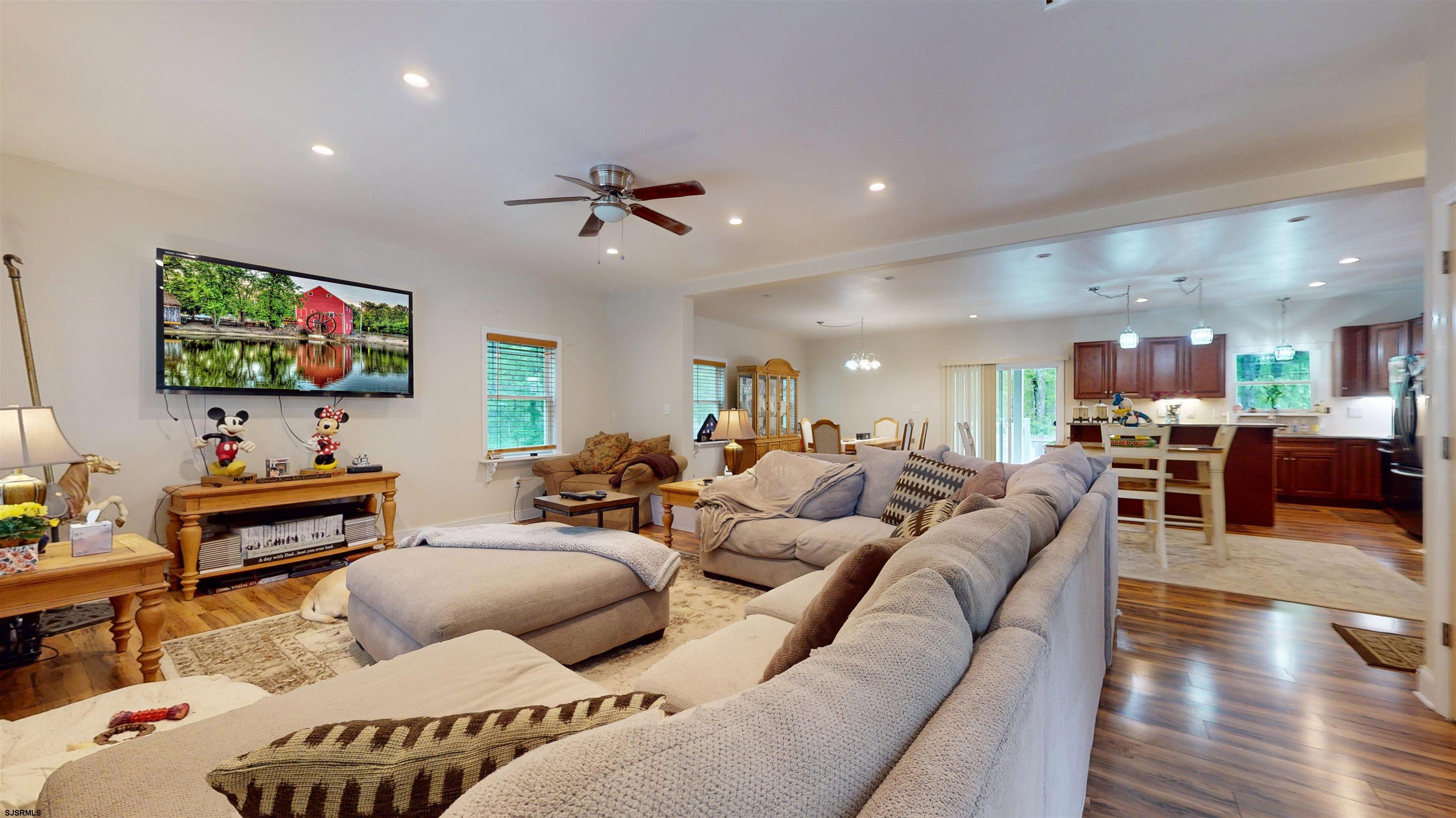 181 3rd Estell Manor, NJ 08319 - Photo 3 of 34 a living room with furniture and a flat screen tv
