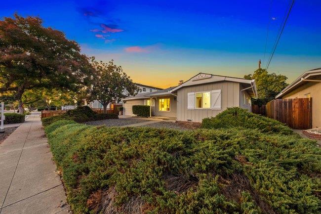 1024 West Riverside Way San Jose, CA 95129 - Photo 2 of 31 a front view of a house with a yard