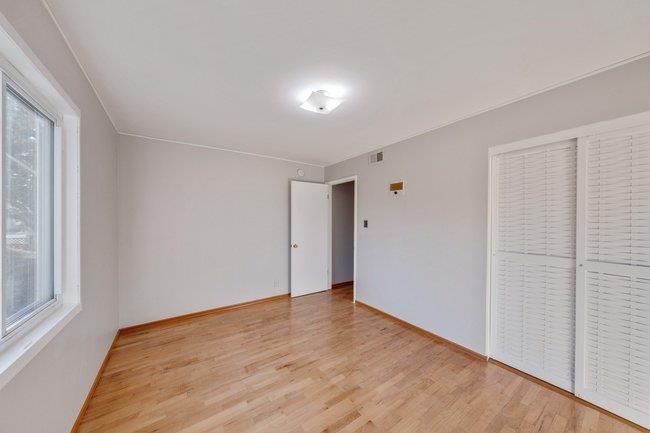 1024 West Riverside Way San Jose, CA 95129 - Photo 14 of 31 a view of empty room with wooden floor and fan