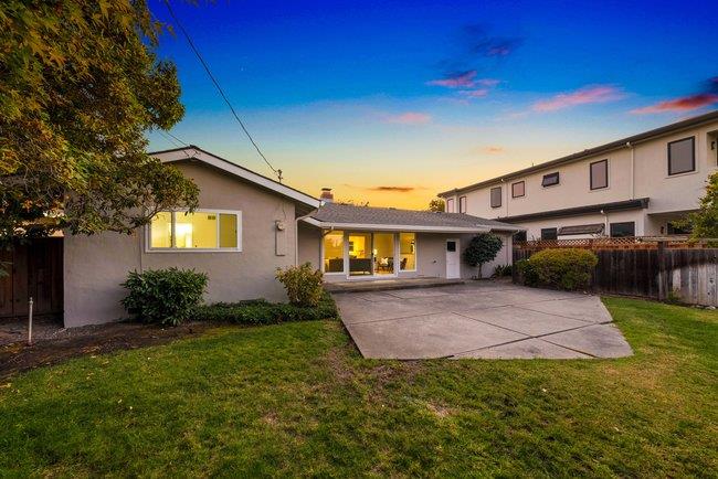 1024 West Riverside Way San Jose, CA 95129 - Photo 23 of 31 a front view of a house with a yard