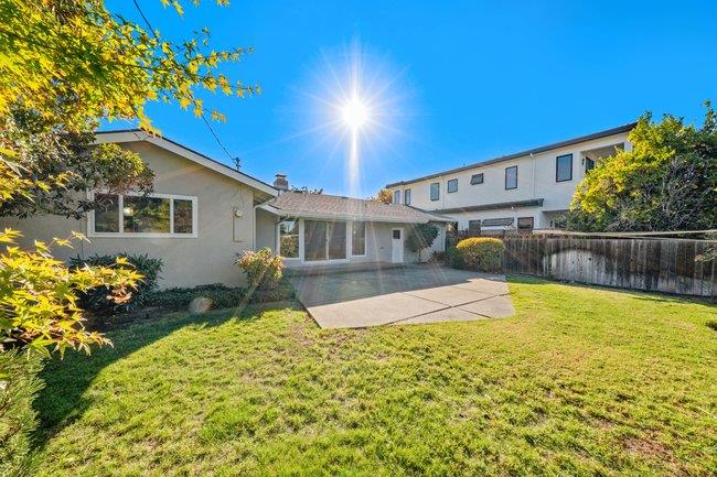 1024 West Riverside Way San Jose, CA 95129 - Photo 26 of 31 a front view of a house with a yard