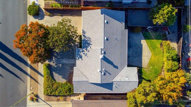 1024 West Riverside Way San Jose, CA 95129 - Photo 31 of 31 an aerial view of a house with a yard basket ball court and outdoor seating