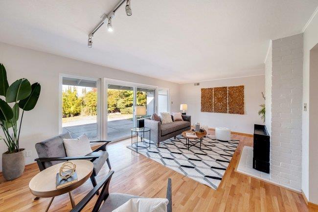 1024 West Riverside Way San Jose, CA 95129 - Photo 9 of 31 a living room with furniture and a table