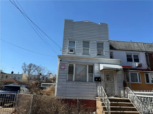 front view of a house with a balcony