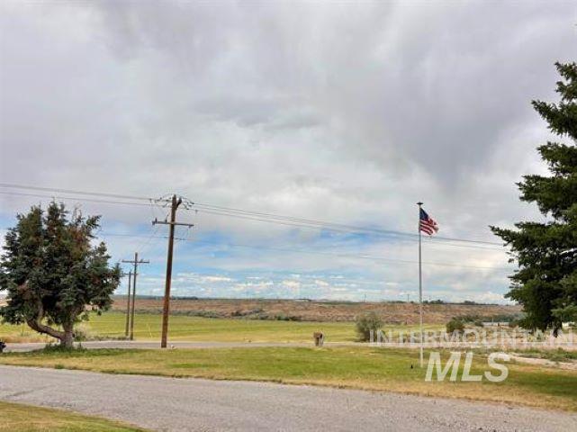 3197 Neeley Road American Falls, ID 83211 - Photo 41 of 45 Expansive green space featuring a flagpole with an American flag