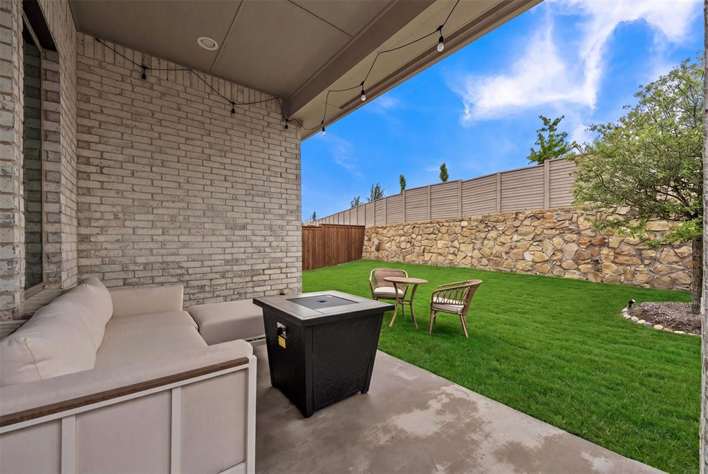228 Palo Duro Bend Rhome, TX 76078 - Photo 28 of 35 a view of a patio with a yard