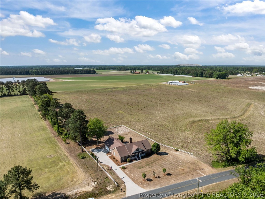 203 White Oak Church Road Clinton, NC 28328 - Photo 2 of 49 a view of a lake with houses in the back
