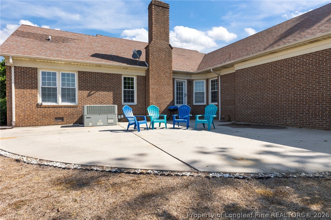 203 White Oak Church Road Clinton, NC 28328 - Photo 35 of 49 a front view of a house with a yard