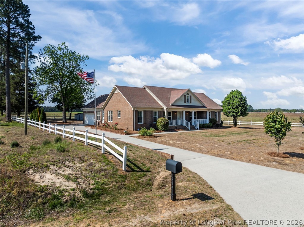 203 White Oak Church Road Clinton, NC 28328 - Photo 45 of 49 a front view of a house with a yard