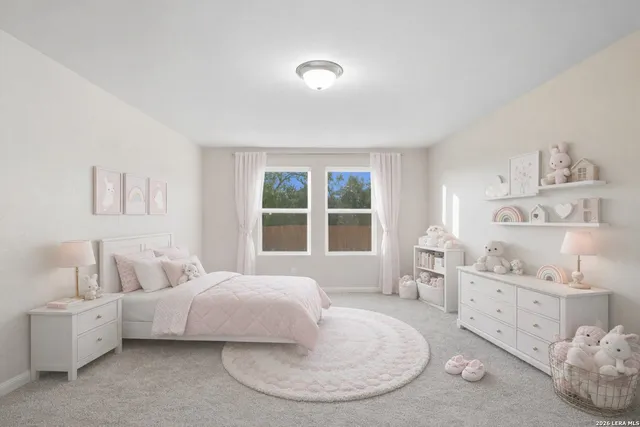 a bed room with a bed and a window