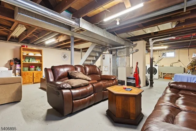 a living room with furniture and a view of living room