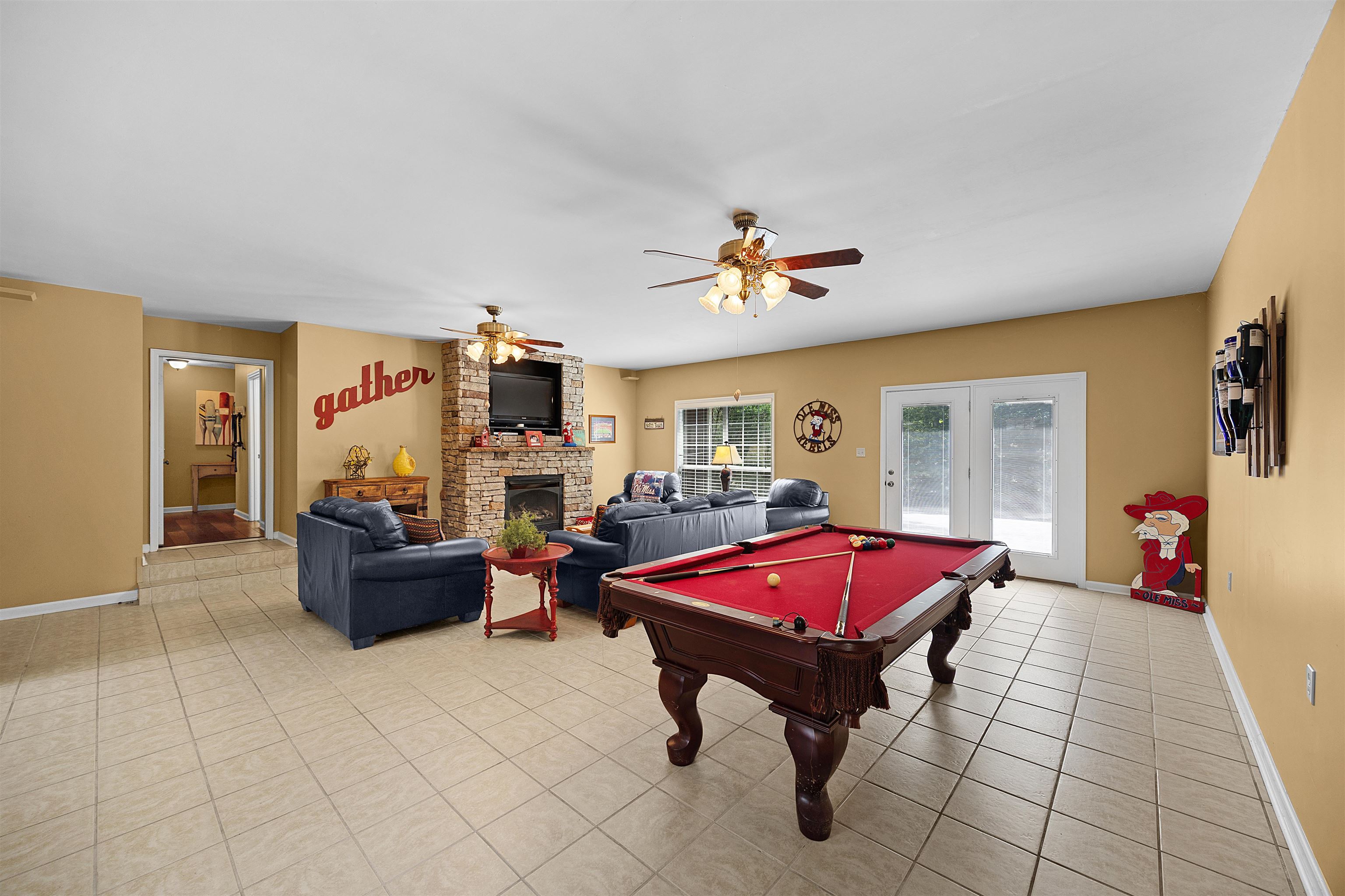 28 County Road 18 Iuka, MS 38852 - Photo 18 of 39 a living room with furniture and a flat screen tv