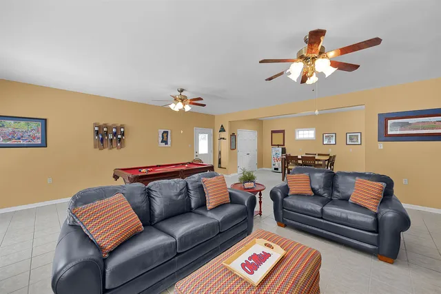 a living room with furniture and a couch