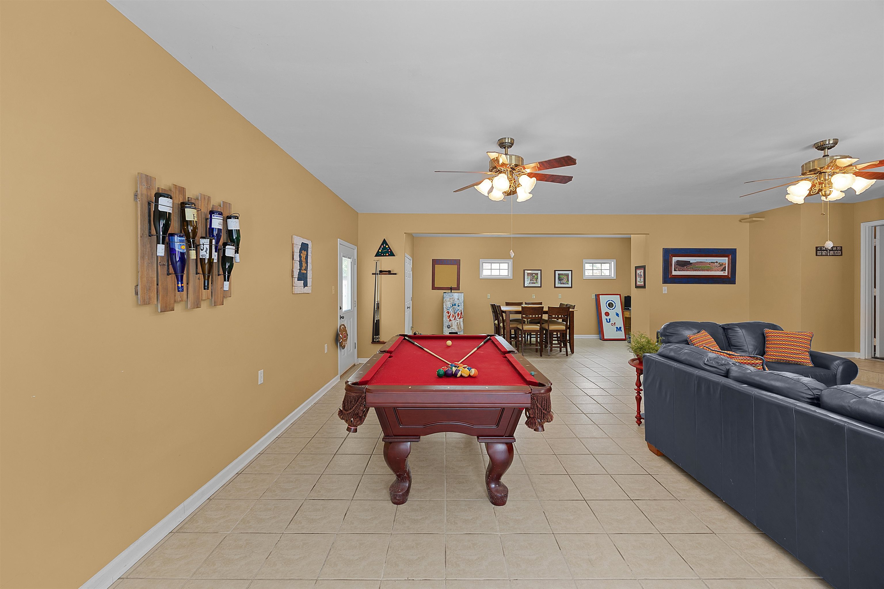 28 County Road 18 Iuka, MS 38852 - Photo 22 of 39 a living room with furniture and a chandelier