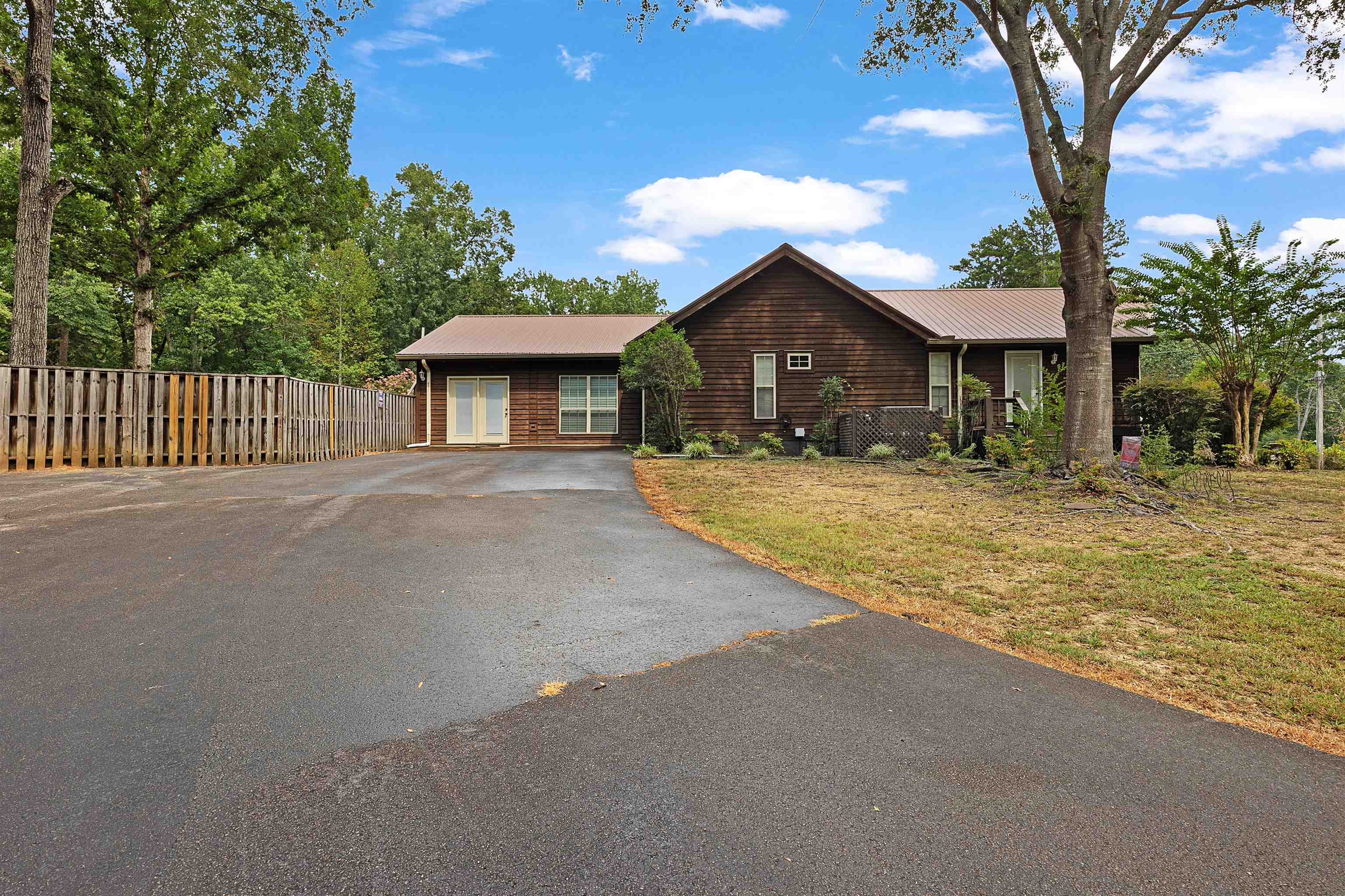 28 County Road 18 Iuka, MS 38852 - Photo 31 of 39 a front view of a house with a yard and garage