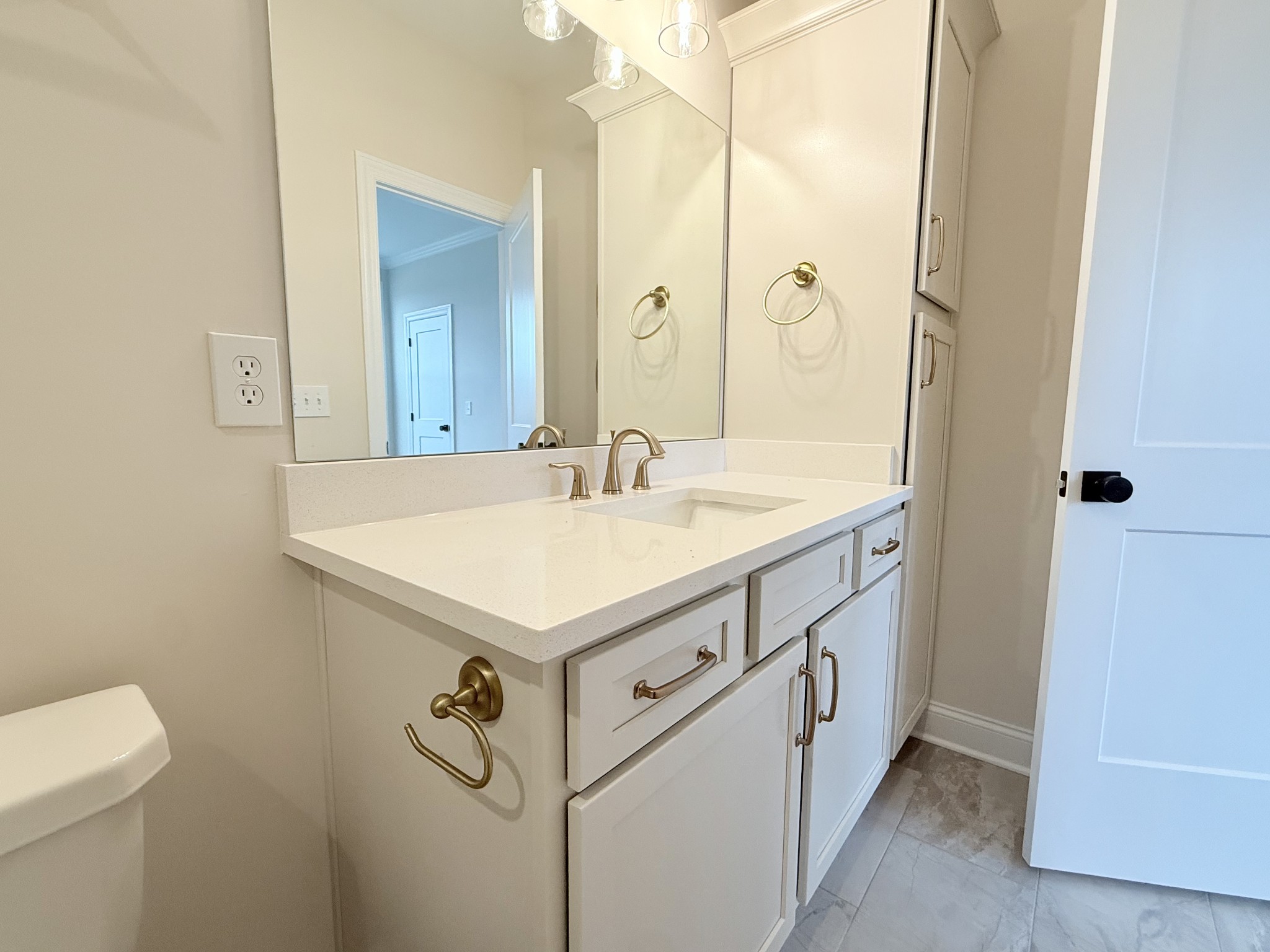 1341 Rebecca Johns Drive Murfreesboro, TN 37128 - Photo 21 of 32 a bathroom with a sink a vanity and a mirror