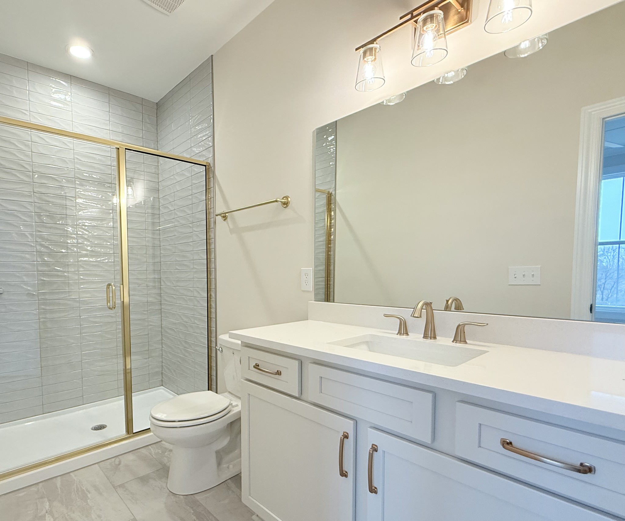 1341 Rebecca Johns Drive Murfreesboro, TN 37128 - Photo 22 of 32 a bathroom with a sink a toilet and shower