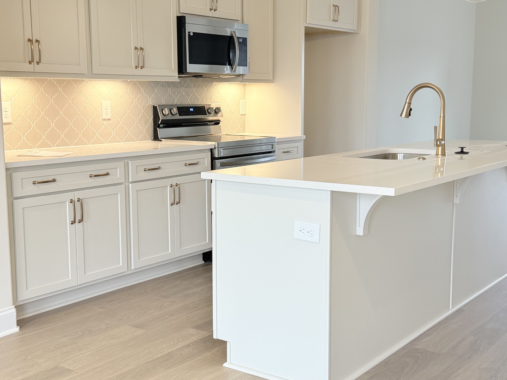 1341 Rebecca Johns Drive Murfreesboro, TN 37128 - Photo 3 of 32 a kitchen with stainless steel appliances white cabinets and a sink