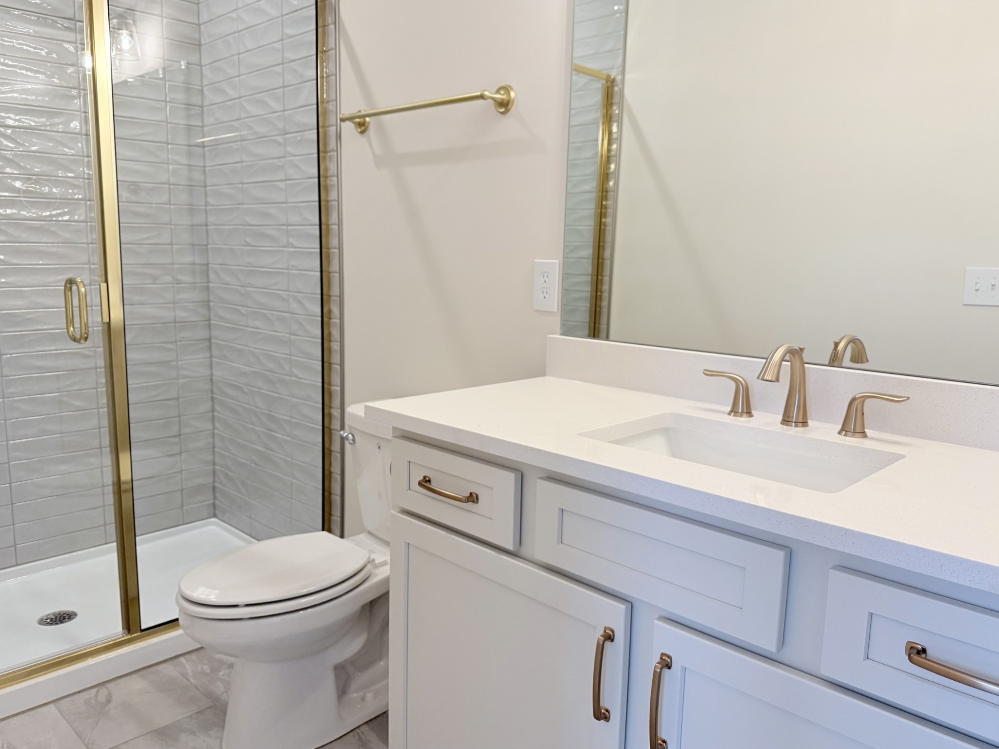 1341 Rebecca Johns Drive Murfreesboro, TN 37128 - Photo 5 of 32 a bathroom with a sink a toilet and shower