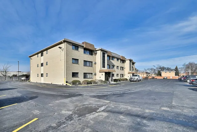 a view of a building with a road