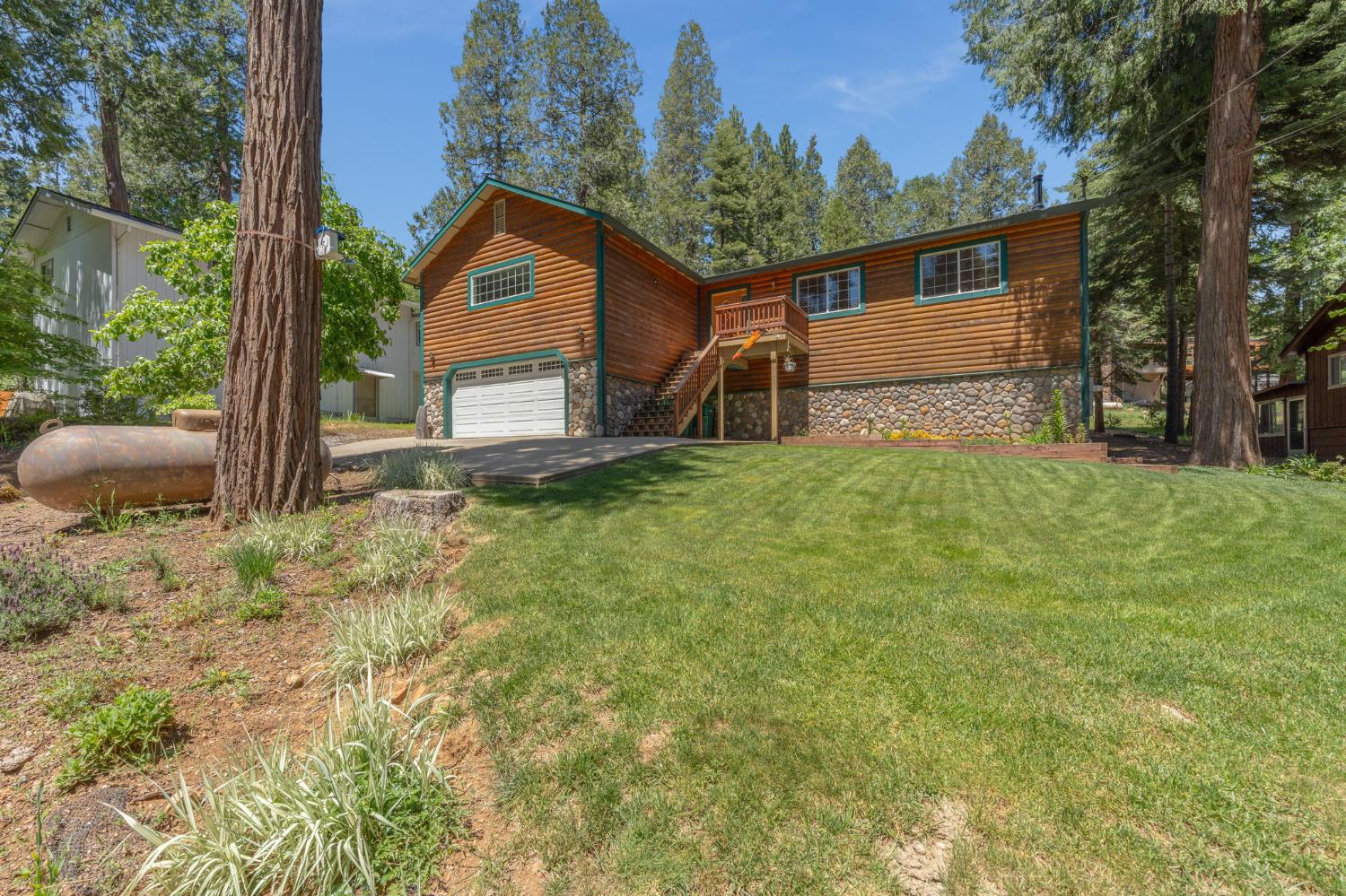 6221 Speckled Road Pollock Pines, CA 95726 - Photo 2 of 41 a house view with a outdoor space