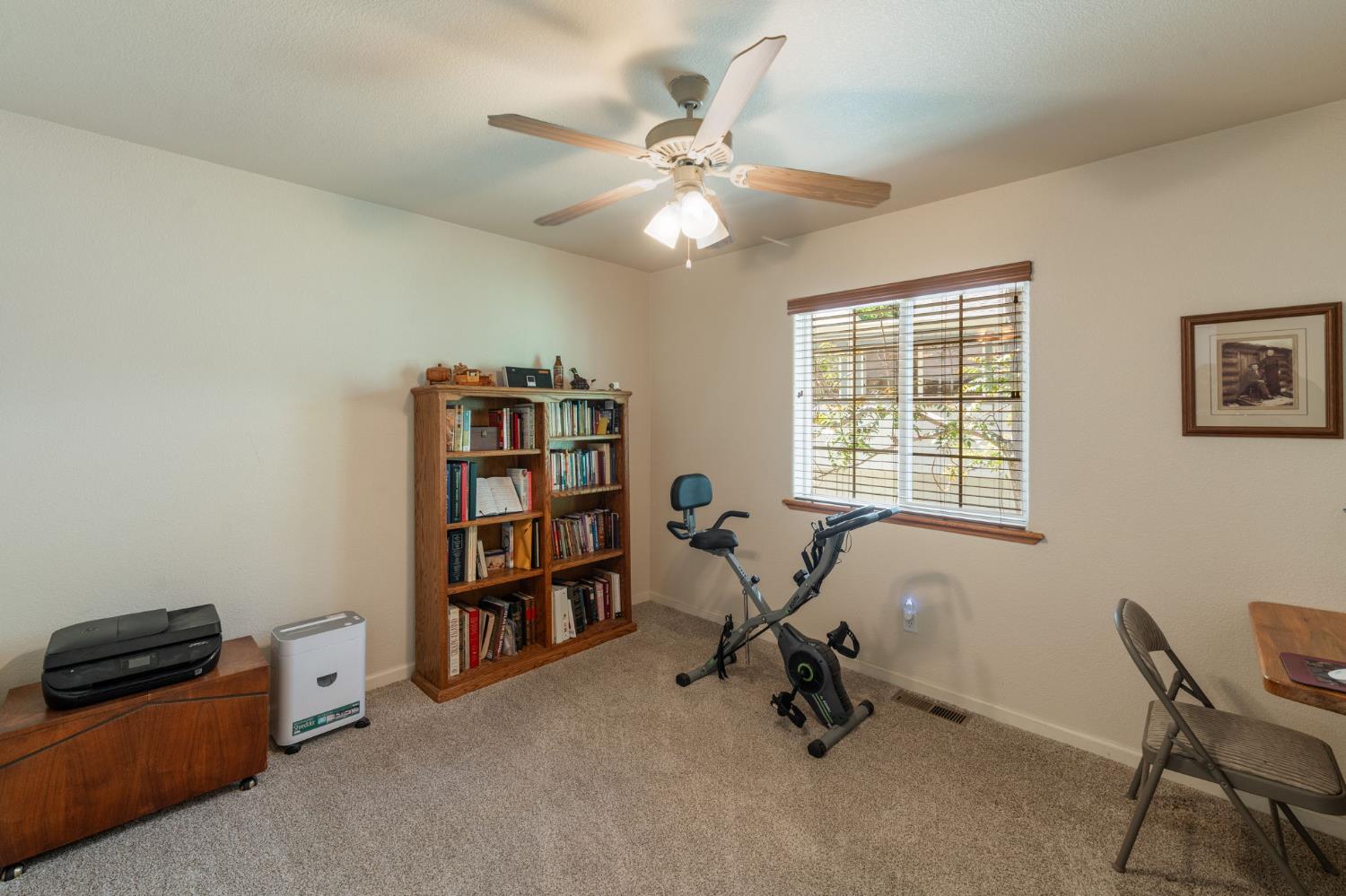 6221 Speckled Road Pollock Pines, CA 95726 - Photo 25 of 41 a view of a workspace with furniture and a window