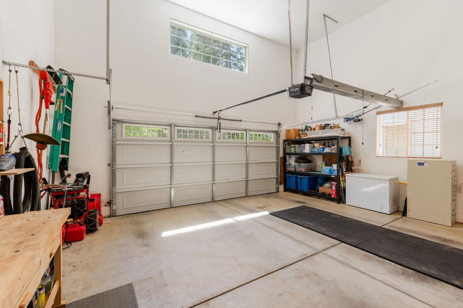 6221 Speckled Road Pollock Pines, CA 95726 - Photo 29 of 41 a view of a garage with rack and bicycle