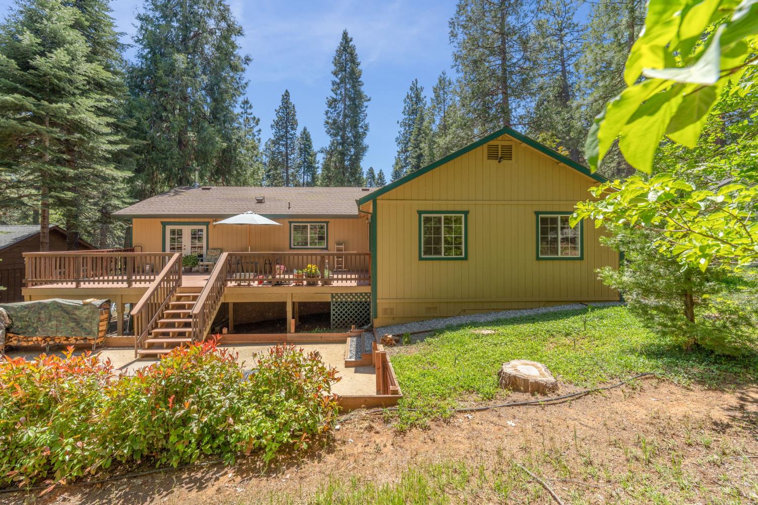 6221 Speckled Road Pollock Pines, CA 95726 - Photo 38 of 41 a front view of a house with a yard