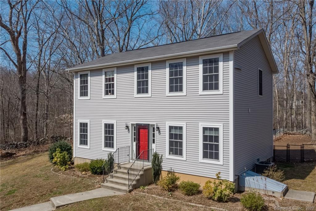 362 Old Clinton Road Westbrook, CT 06498 - Photo 1 of 1 a front view of a house with a yard